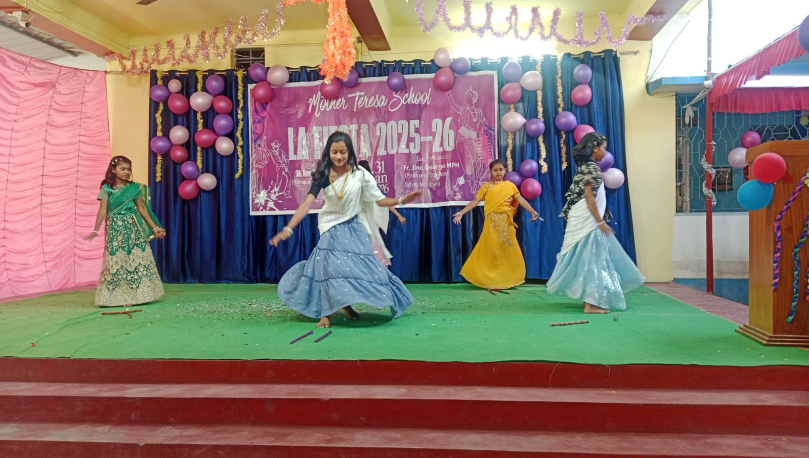Students Performing Folk Dance on Stage